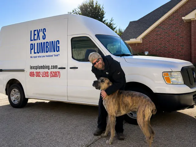 Lex's Plumbing technician working under a sink
